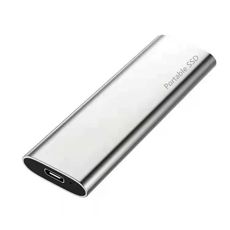 Red portable metal SSD hard drive with ultra-thin design on a grey background.
