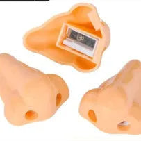 Flesh colour plastic manual pencil sharpener with big nostril, showing geometry shape.