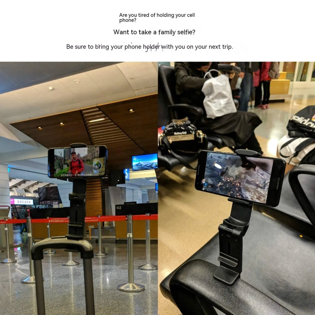 Black foldable and rotating universal mobile phone holder on a table.
