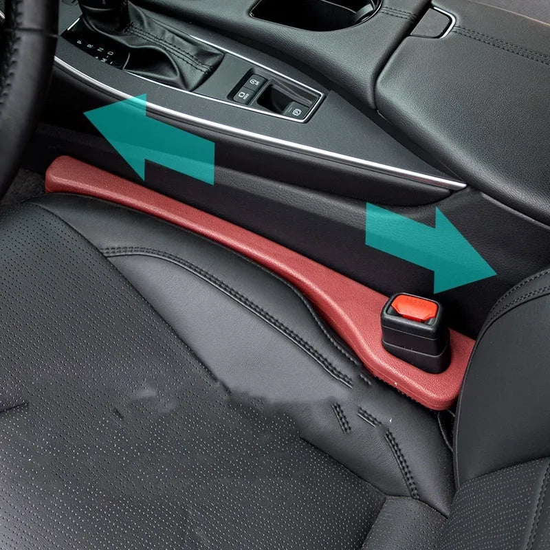 Two polyresin car seat gap sealing strips in chosen colour, shown next to a vehicle seat.