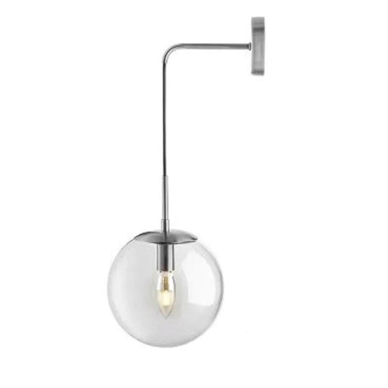 Nordic glass wall lamp with amber glass shade, black metal body, mounted on wall