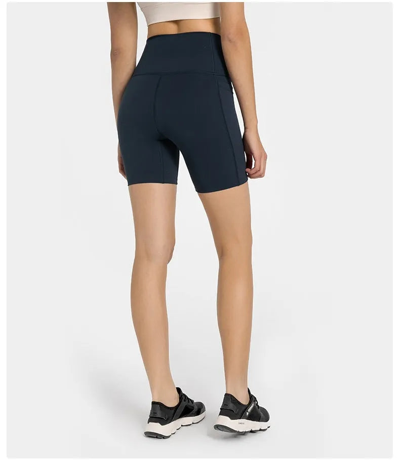 Women's tight-fitting super stretch sports shorts in grey lake green, short length for running.