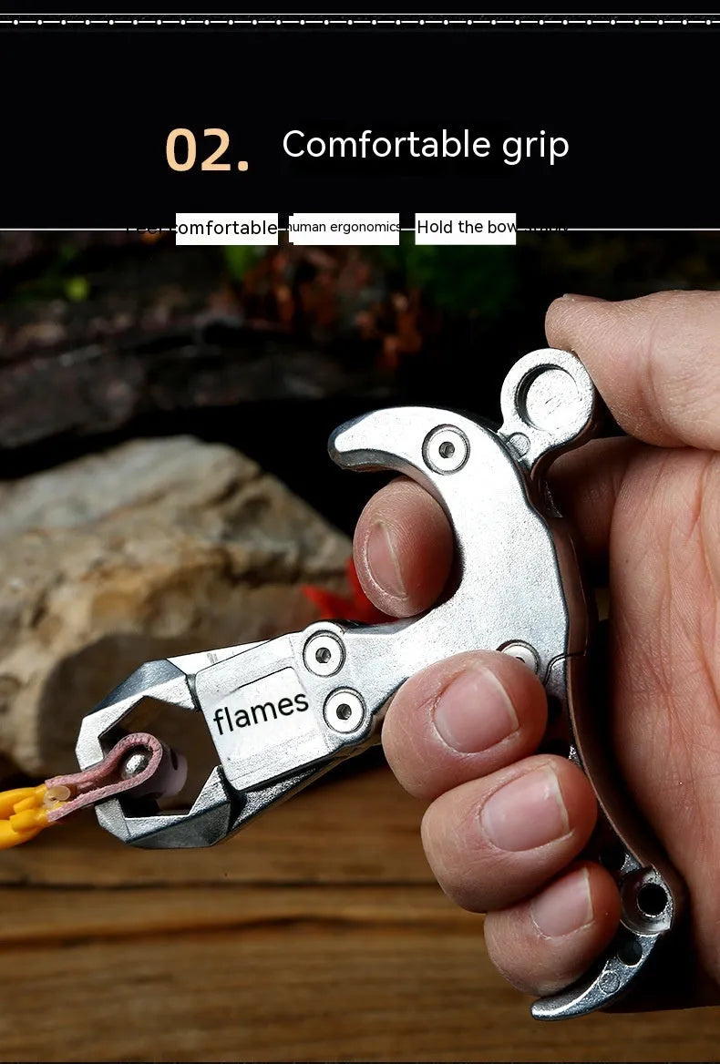Zinc alloy fishing release aid with a two-axis harpoon clip and stainless steel components.