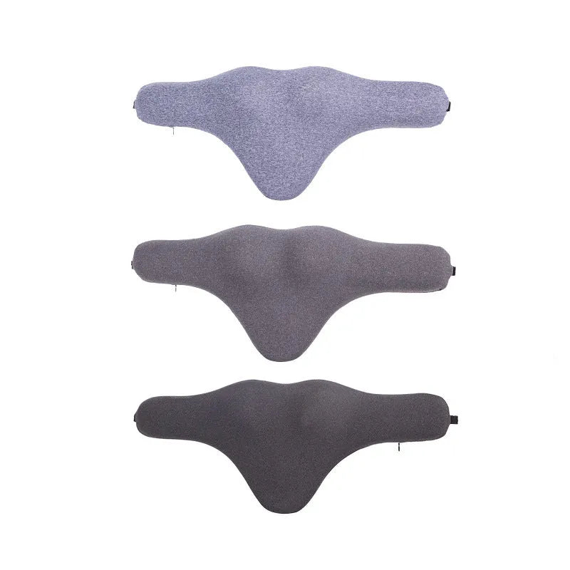 Solid-colour memory foam car neck pillow on a car headrest in dark grey, grey, or fog blue