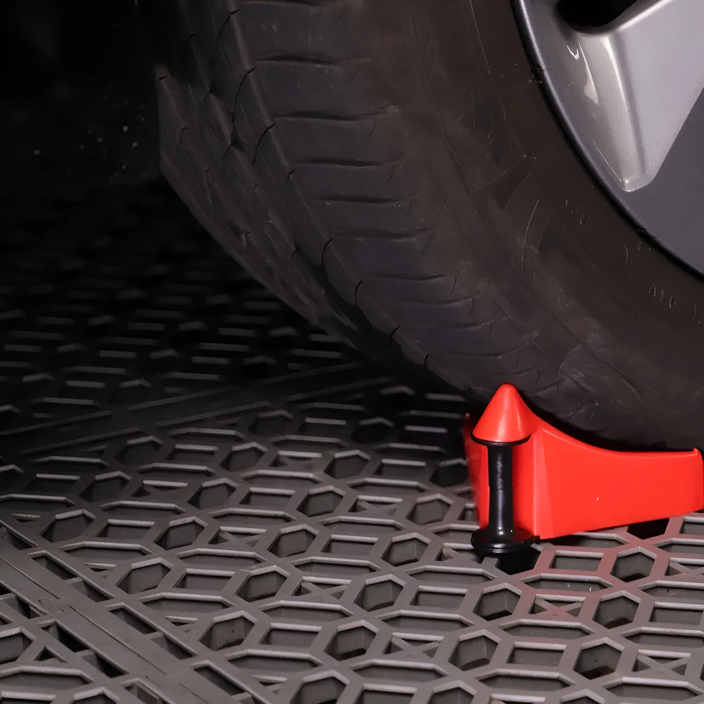 Red plastic parking chock set of four pieces with non-slip rubber surface