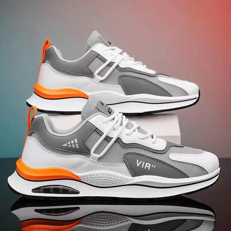 Men's grey and black mesh running shoes with EVA sole and sewing thread detail on a white background.