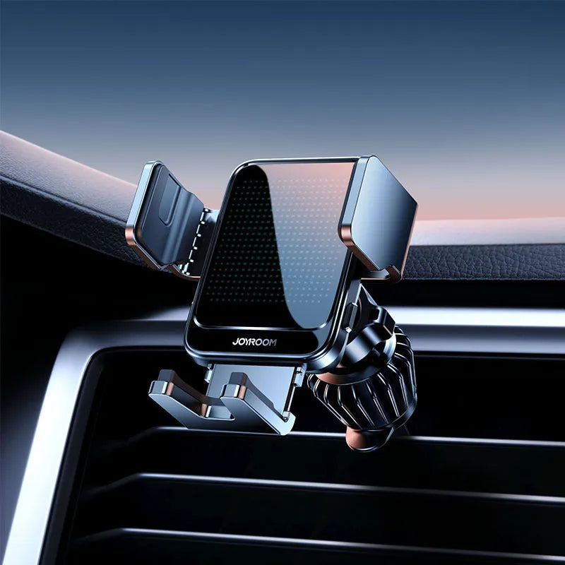 Black car wireless charging bracket mounted on air vent, showing phone being placed on automatic holder.