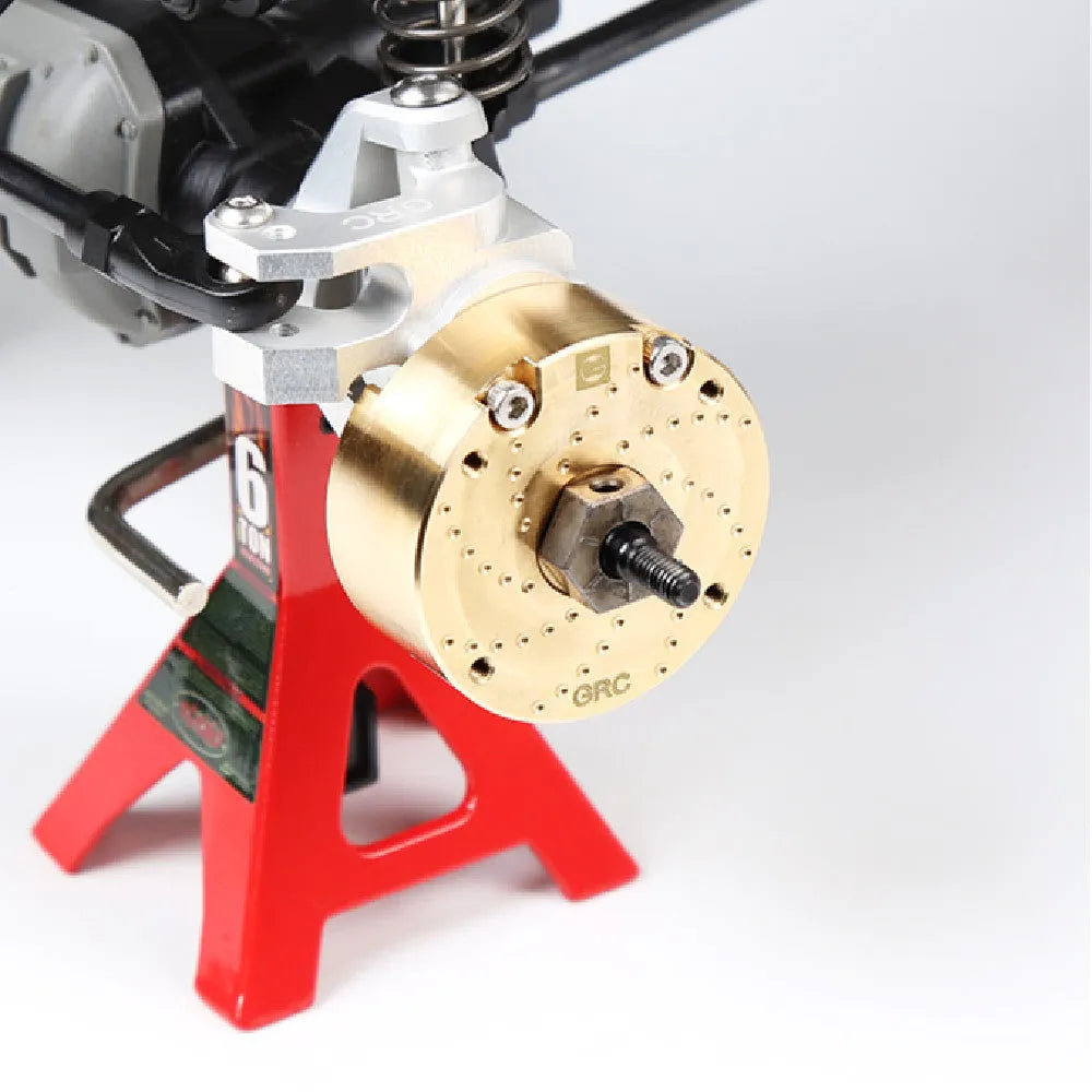 Brass gearbox cover accessory for toy axle door side installation