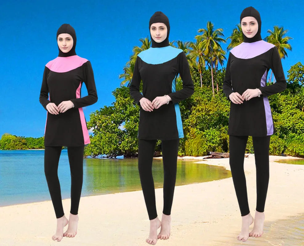Conservative black and rose red women's swimsuit set with long sleeves, hood, and trousers.