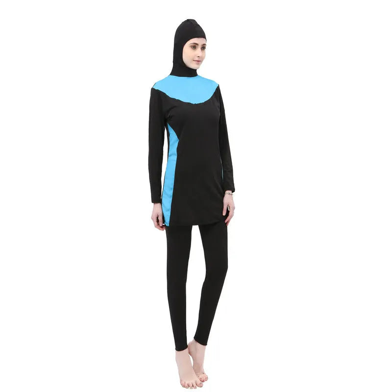 Conservative black and rose red women's swimsuit set with long sleeves, hood, and trousers.
