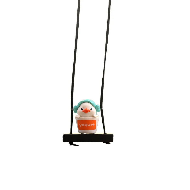 Cute yellow plastic duck doll car hanging ornament in a cartoon style.