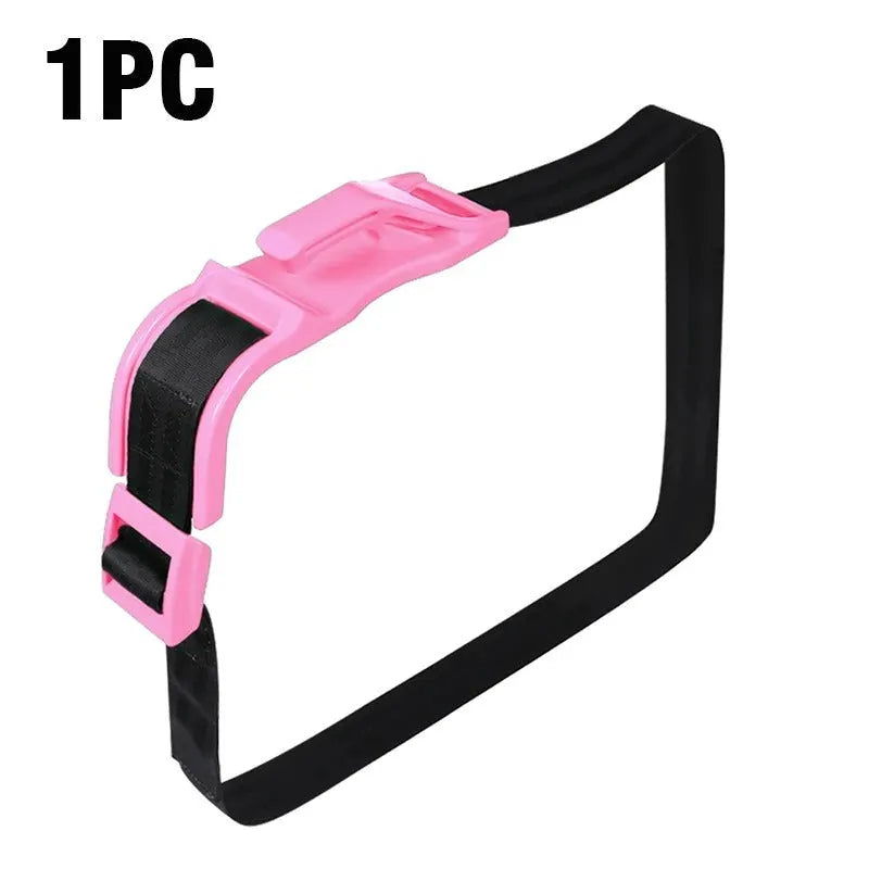 Black universal pregnancy car seat belt adjuster buckle on a car seat.