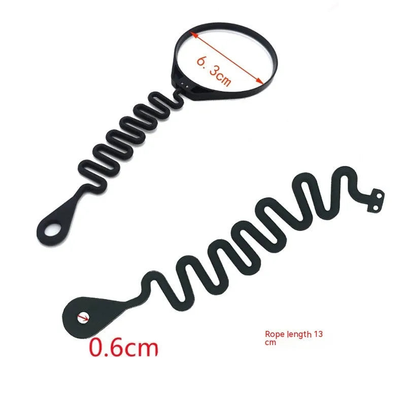 Black rubber Volvo fuel cap tether showing circle band and separate rope anti-lost designs