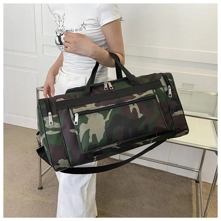 Camouflage coloured waterproof luggage bag with striped polyester lining.