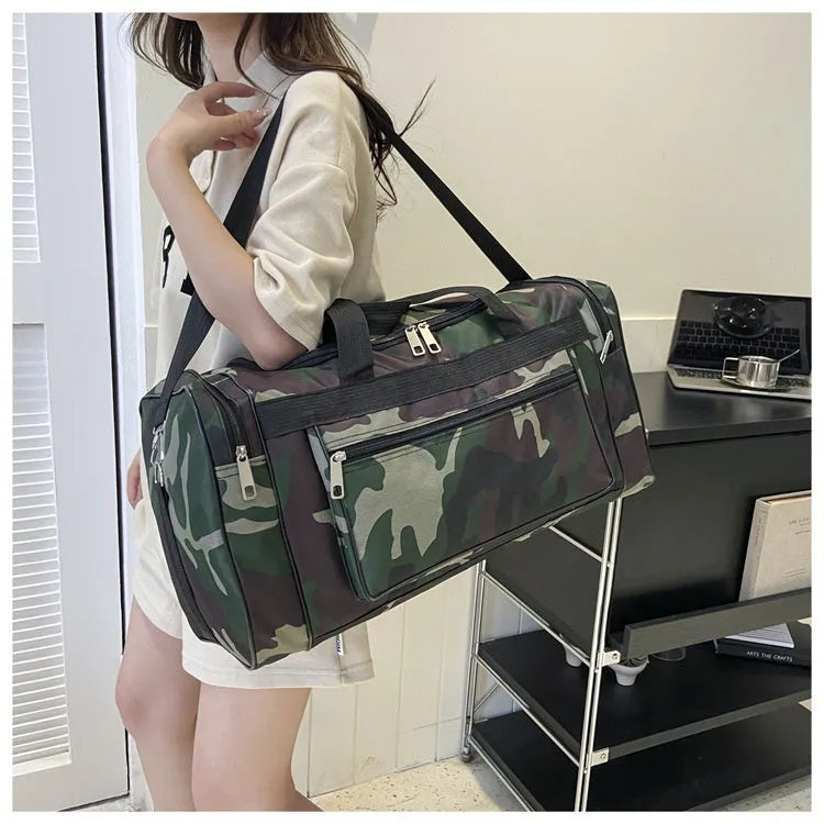 Camouflage coloured waterproof luggage bag with striped polyester lining.
