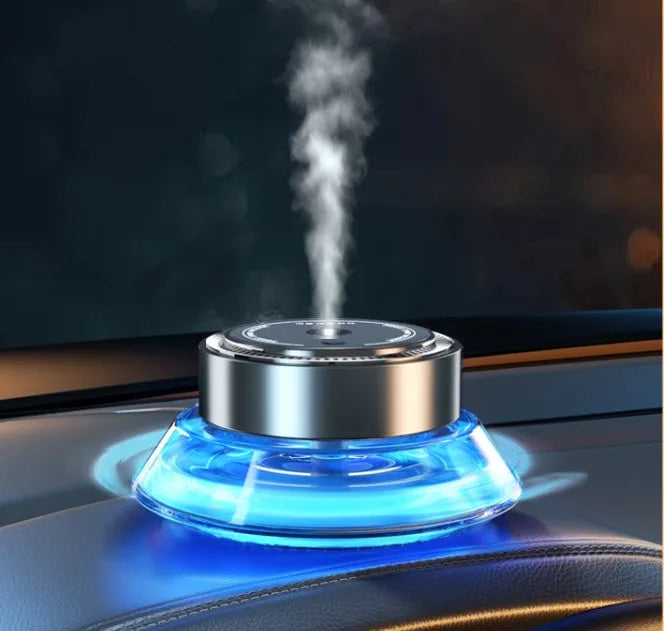 Smart Spray car-mounted air freshener unit in black and green colour options with refill bottle.
