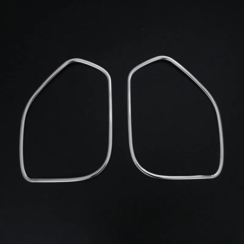 Two silver stainless steel door audio frame trim pieces for ROOX40 series vehicles