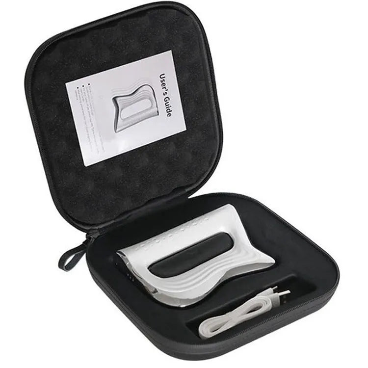 Rectangular natural resin muscle massager and scraping board on a flat surface.