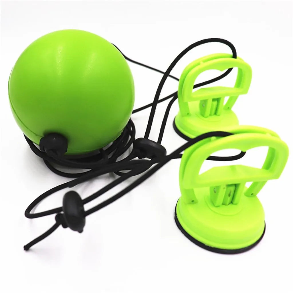 Green PU suction cup suspended boxing speed ball hanging from a suction cup mount for reflex training.