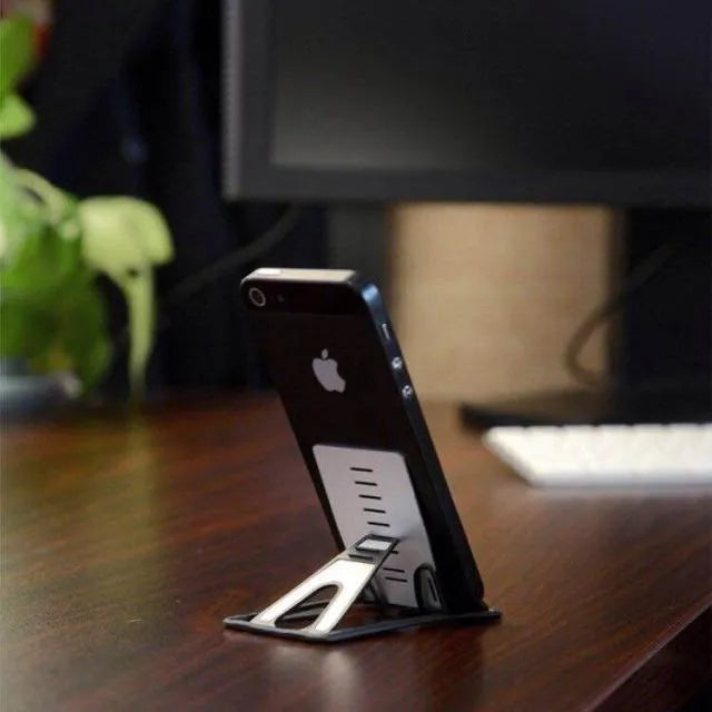Black desktop phone bracket stand measuring 8.5cm by 5cm with lazy bracket mechanism