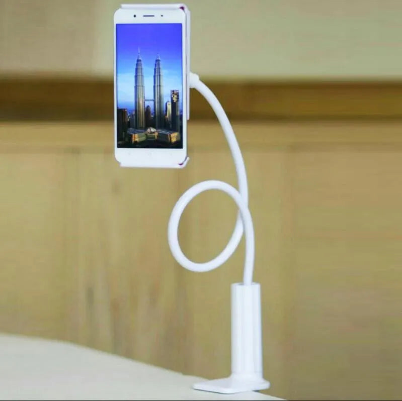 Black aluminium alloy bedside phone stand with a long arm on a wooden table.