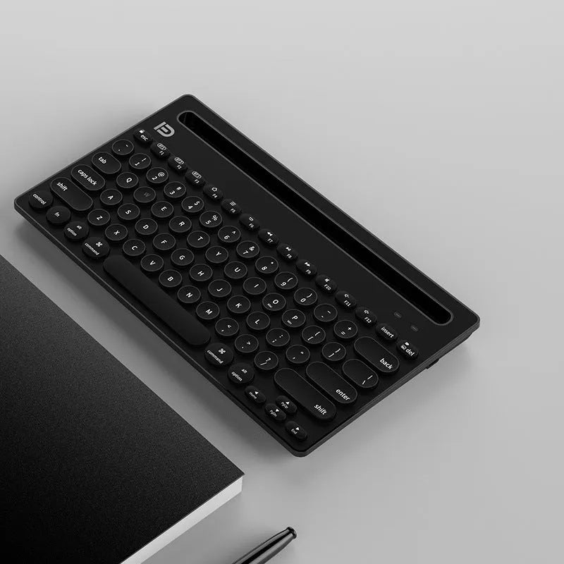Wireless Bluetooth keyboard in black and pink colours, ultra-slim 22mm profile, compact 297x178mm size for home and office use