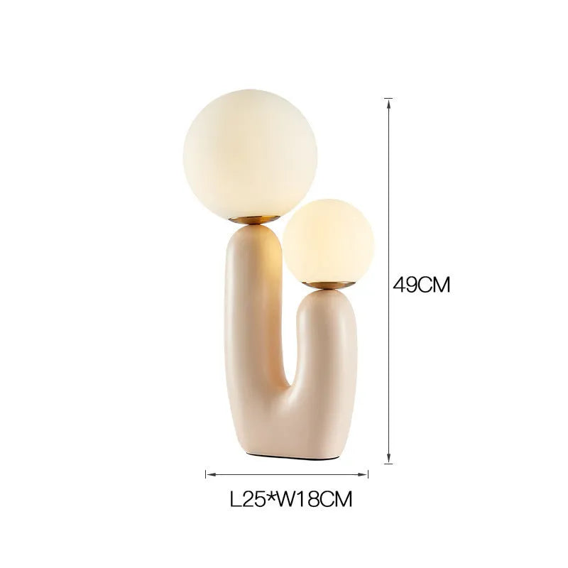 Double-head resin table lamp with pink baking paint finish, glass shade, 49cm height, on bedside table
