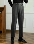 Grey high-waist straight-leg casual trousers on a hanger, showing button and zip detail.