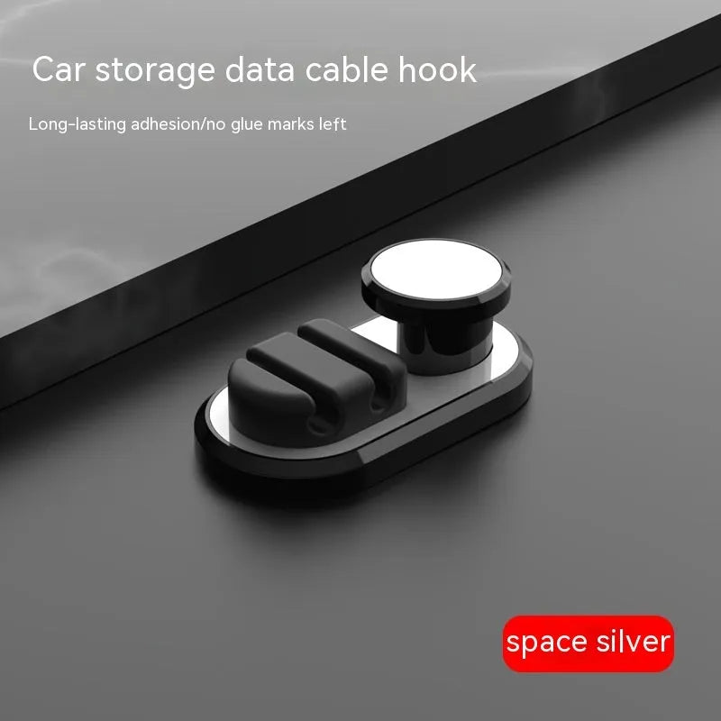 Adhesive car storage hook for cables in dark green colour showing dimensions and mounting surface
