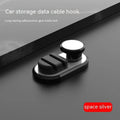 Adhesive car storage hook for cables in dark green colour showing dimensions and mounting surface