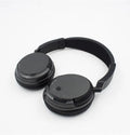 Black wireless stereo headphones with USB FM transmitter and 3.5mm audio cable