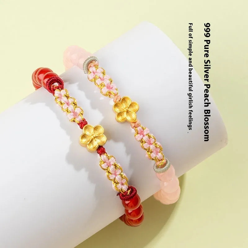 Chinese style hand-woven red rope bracelet with natural crystal peach blossom charms
