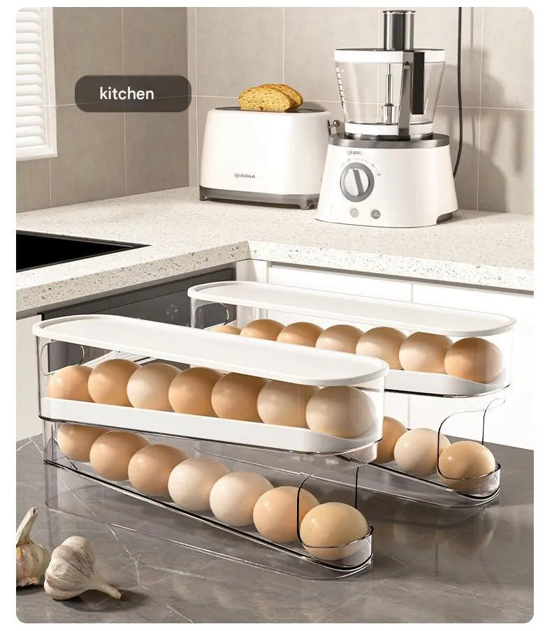 White plastic slide-out egg tray for refrigerator door with automatic dispenser and clear view window.