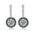 S925 sterling silver geometric drop earrings with black onyx and zircon inlay on white background