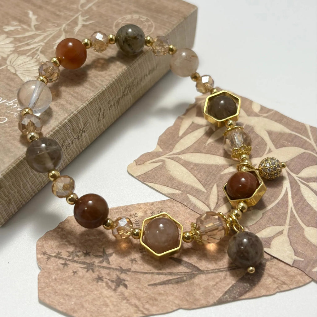 Gold citrine crystal bracelet with hand-woven auspicious symbols including Ruyi, Totem and Fu character patterns