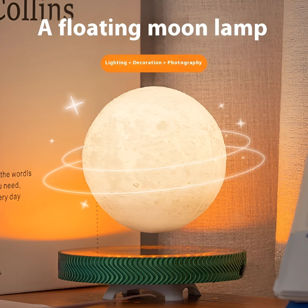 A small, 3D-printed moon night light hanging in mid-air via magnetic suspension.
