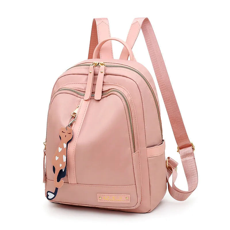 Black casual nylon backpack with double shoulder straps and external pocket.