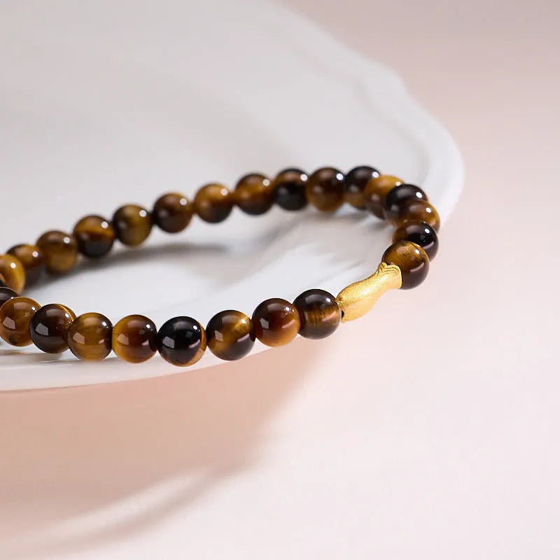 Handmade tigereye beaded bracelet with small fish pendant, natural stone beads, multiple colour options including golden tiger eye