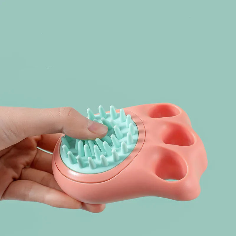 Pet bath brush with silicone cat claw design and massage nodules for dog and cat grooming during bath time