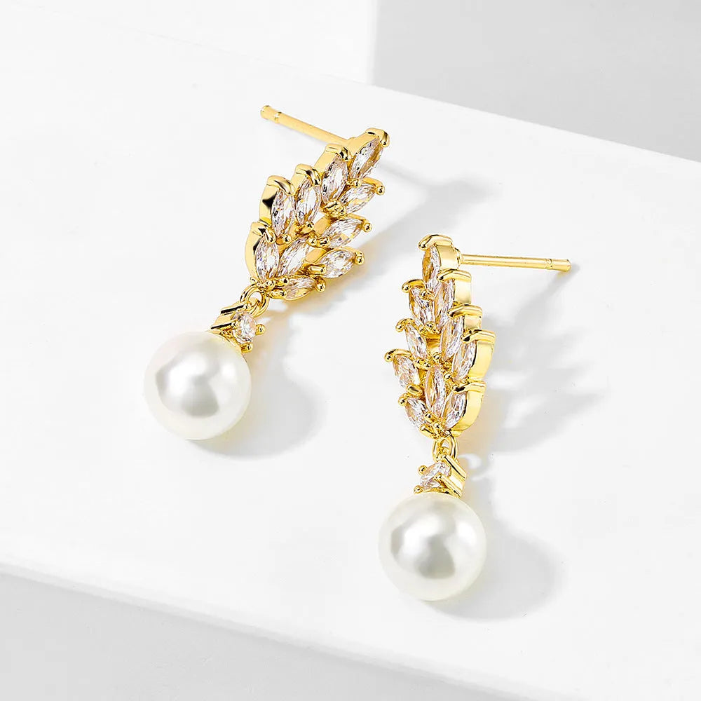Geometric flower earrings with micro inlaid zircon in gold, rose gold, and white gold plated finishes.