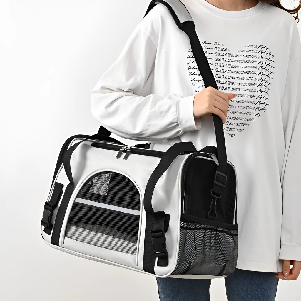 Portable outdoor pet carrier bag in Oxford cloth with side zipper openings, for cats and dogs under 10 kg