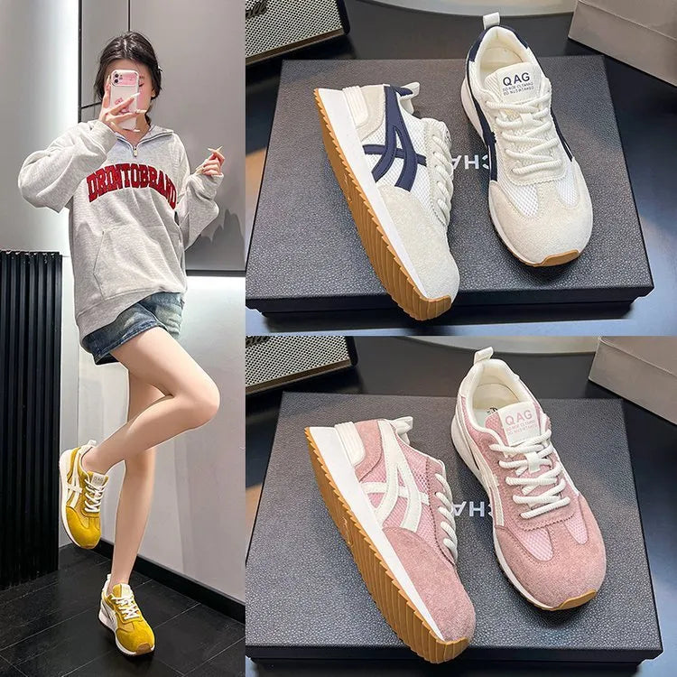 Women's white low-top lace-up sneakers with round toe and plastic sole