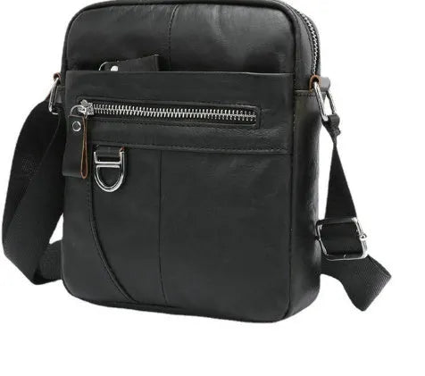 Brown genuine leather messenger bag with crossbody strap showing sewing-line detailing