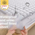 Washed cotton waterproof fitted sheet for beds in blue, shown on a mattress