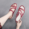 Women's solid colour PP beach sandals in red, purple, blue, black, grey, or pink showing slip-on casual style