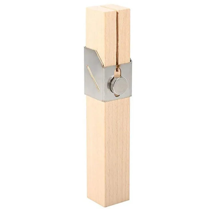 Plastic bottle cutter in log colour, 2.2 by 2.2 by 14 cm, on a table