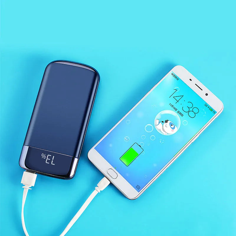 Portable power bank with LCD display showing battery percentage and two USB charging ports