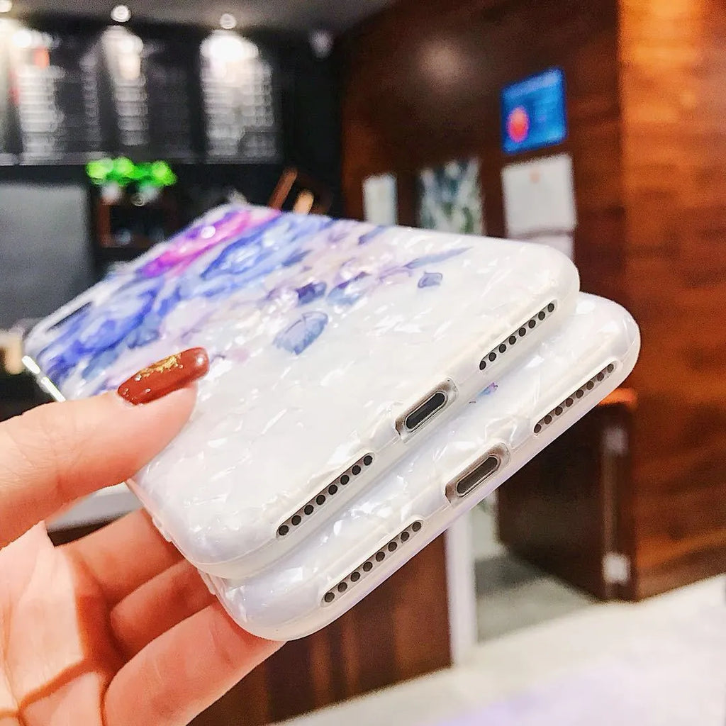 Dream Shell soft TPU iPhone case shown in brown, purple and white colours for multiple iPhone models.