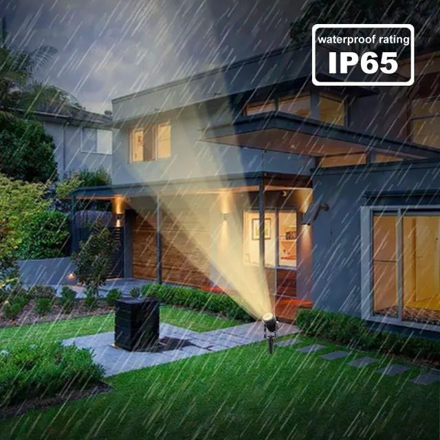Solar lawn lamp with aluminium frame and white LED panel on grass