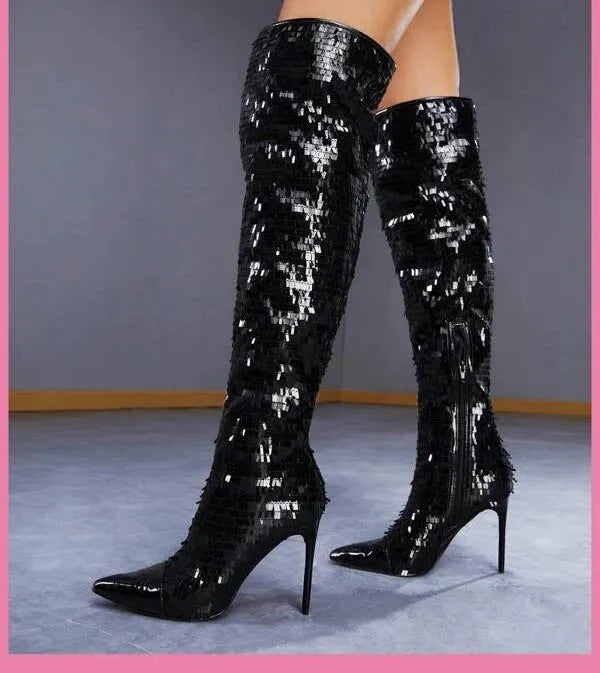Women's black sequin over-the-knee boots with PU leather upper on display